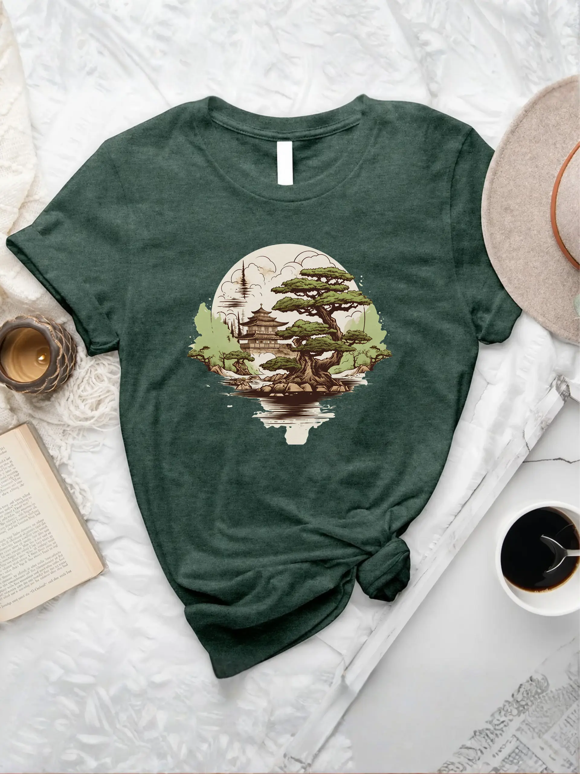 Bonsai Oasis T-shirt in Heather Forest with a Japanese bonsai tree, pagoda, mountains, and water reflection graphic