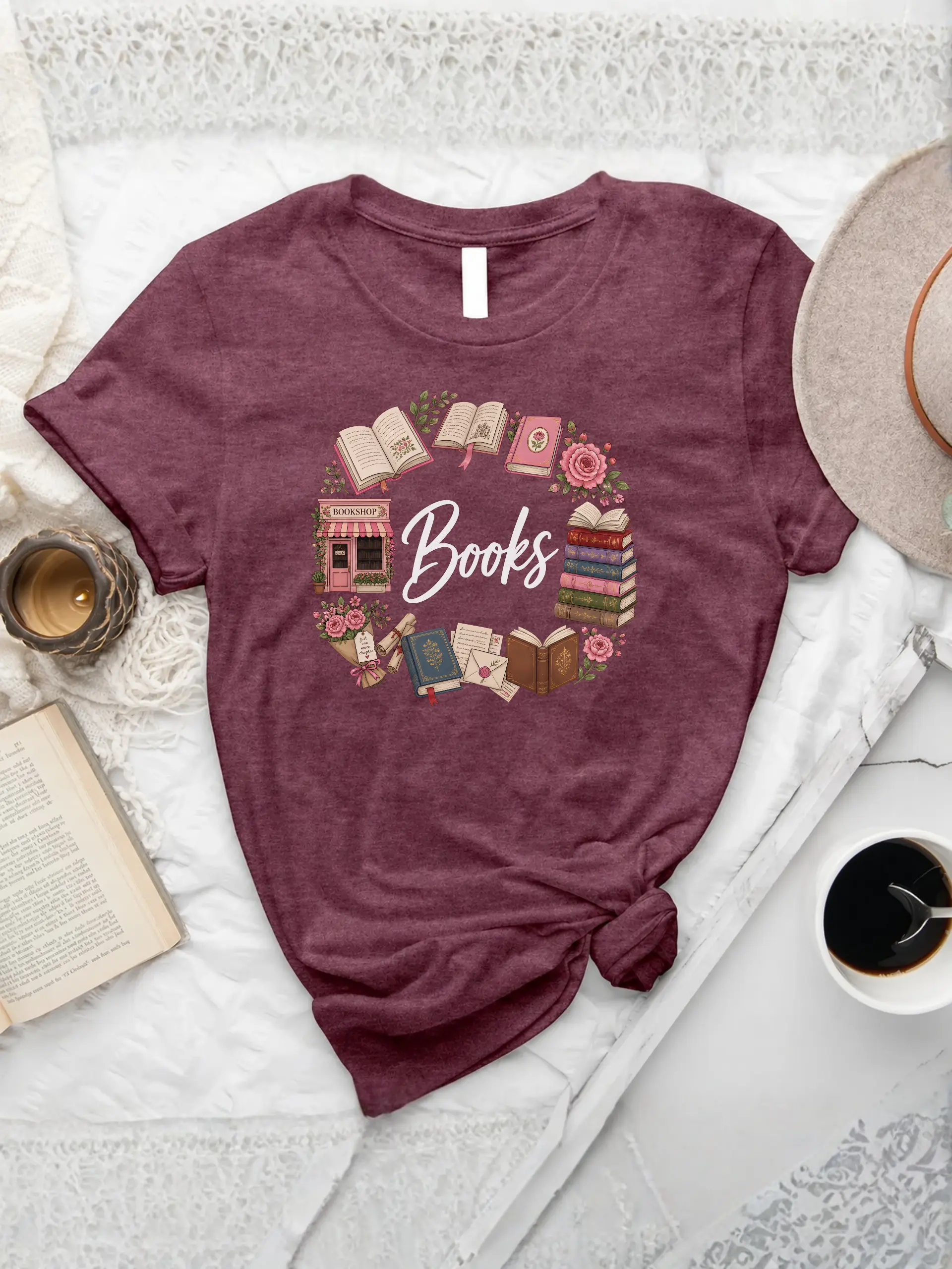 Book Wreath T-Shirt in Heather Maroon with vintage books, pink roses, bookshop, letters, and literary accessories