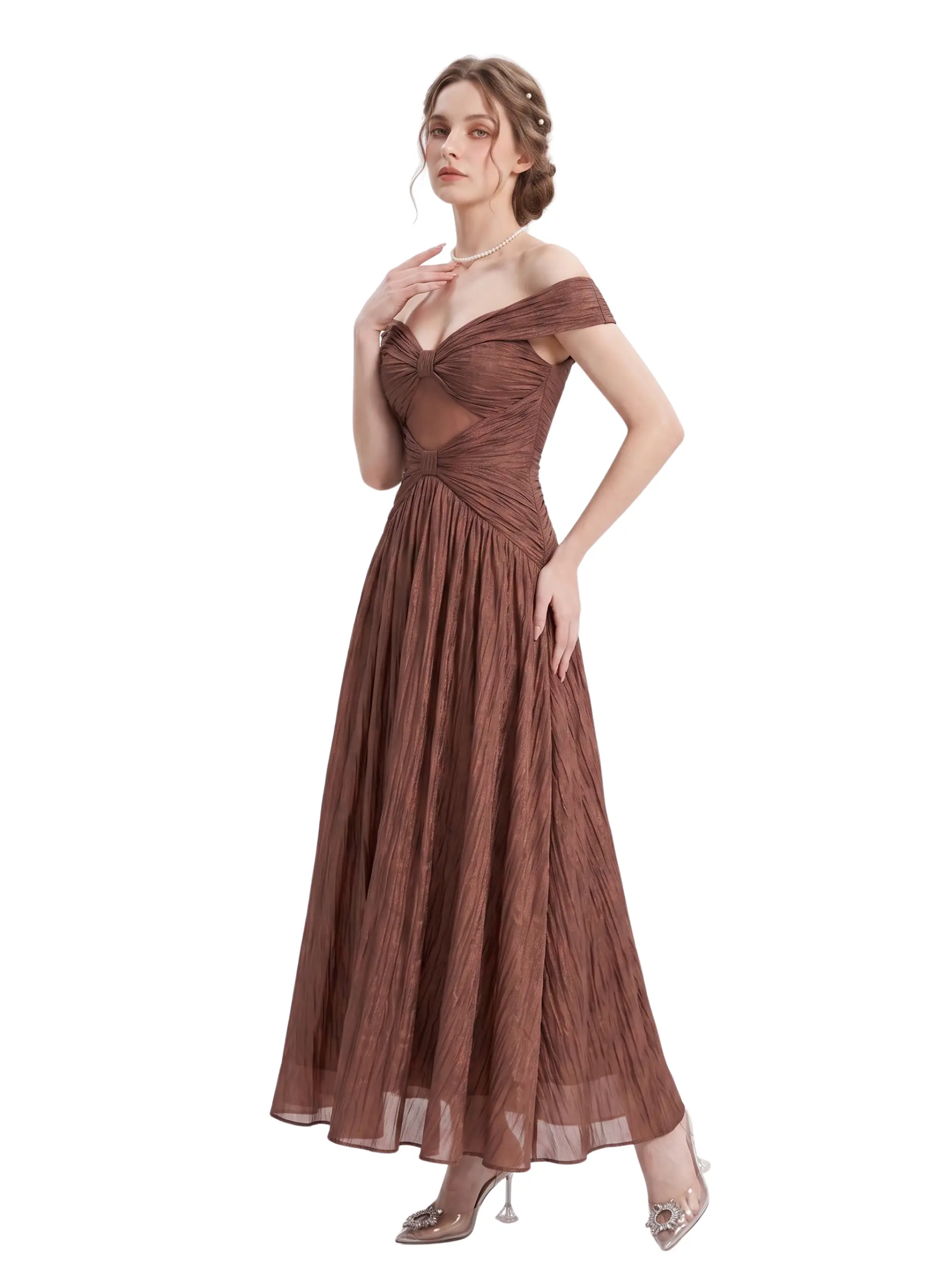 Model wearing the Elowen brown off-the-shoulder corset maxi dress in a three-quarter view, featuring sculptural ruching, a sheer illusion panel, and a flowing A-line skirt.