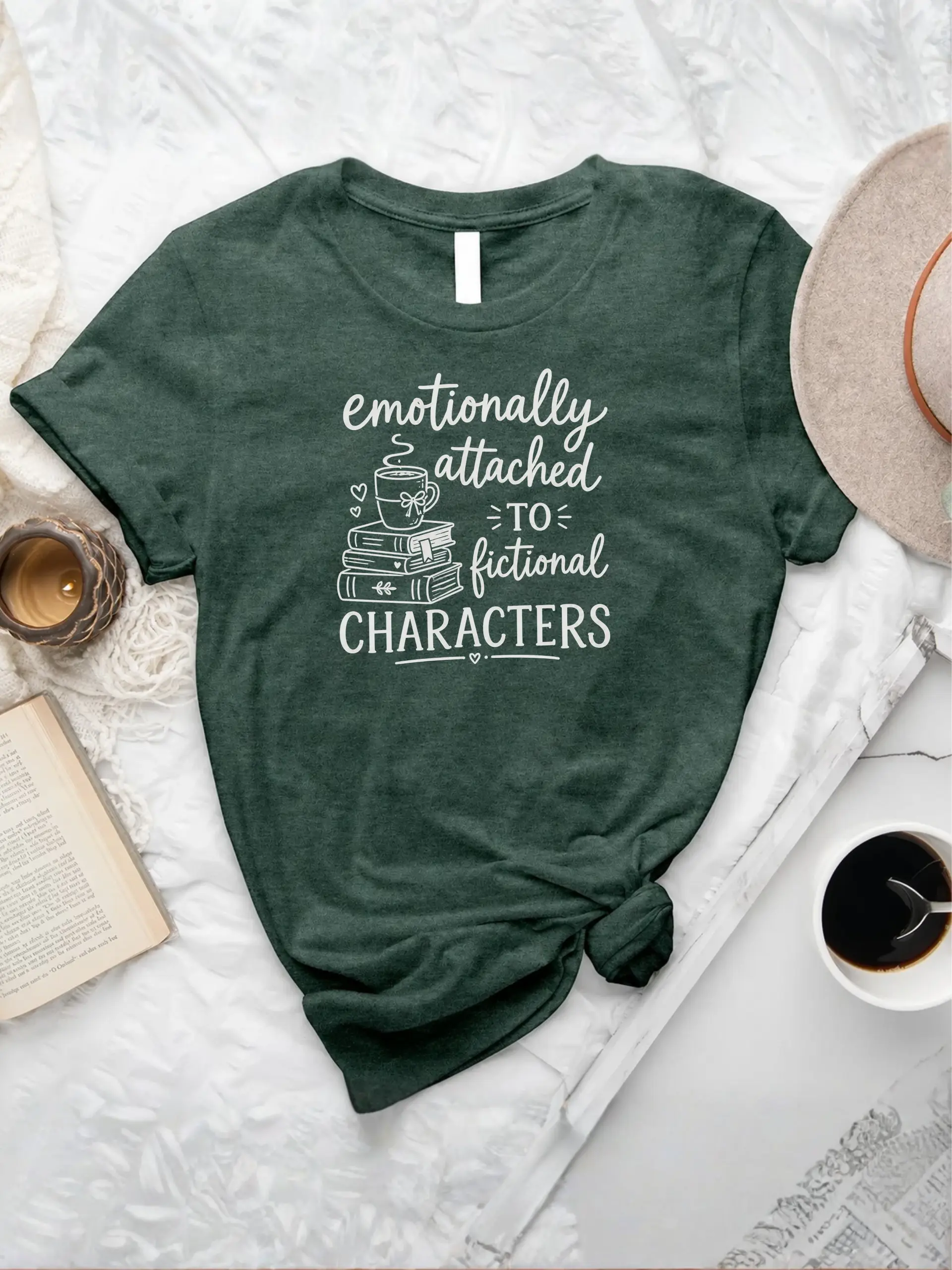 Emotionally Attached T-shirt in Heather Forest with books, coffee mug, and fictional characters quote graphic