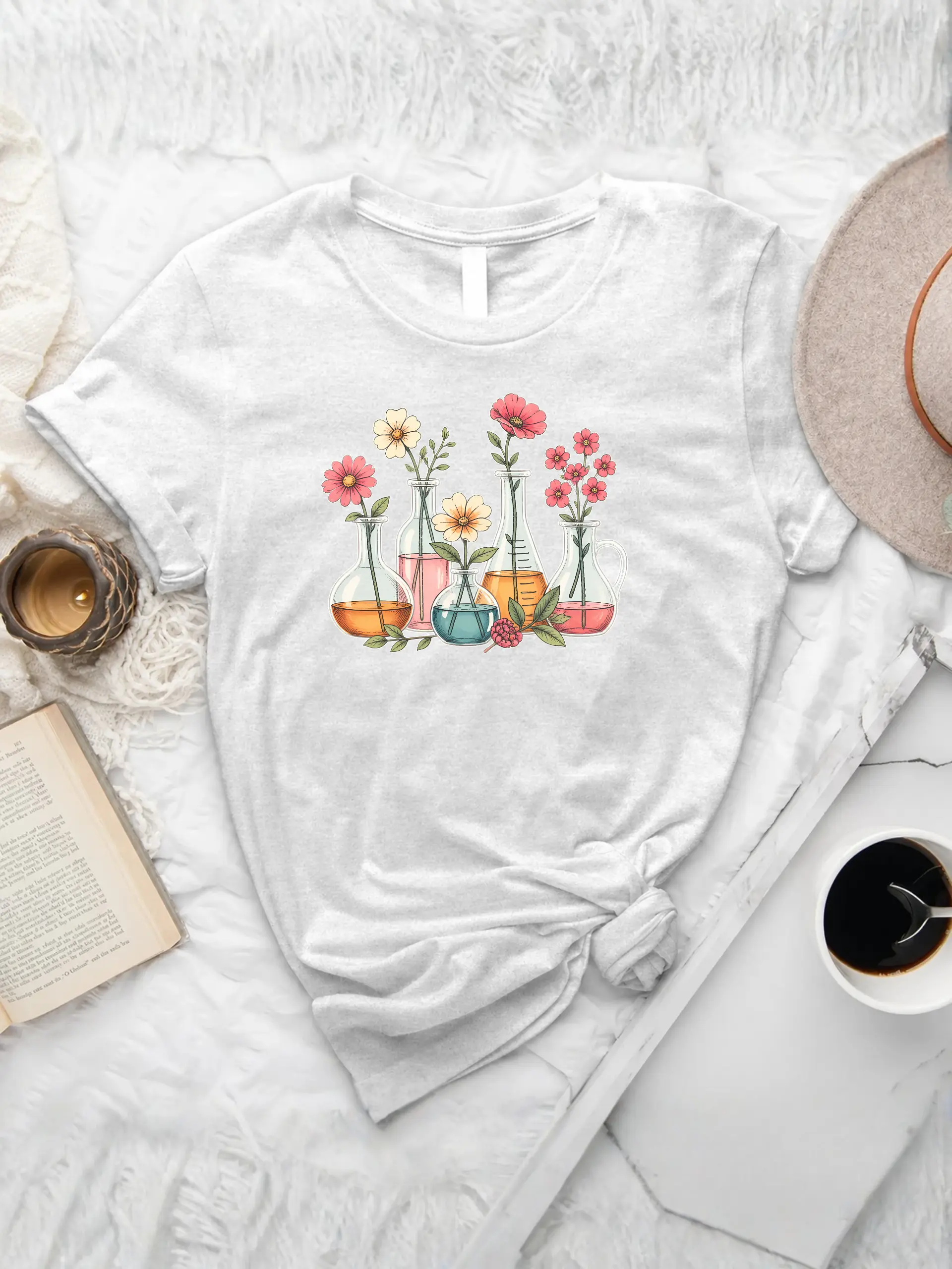 Floral Beakers Chemistry Lab T-Shirt in White with colorful laboratory flasks, blooming flowers, and botanical details