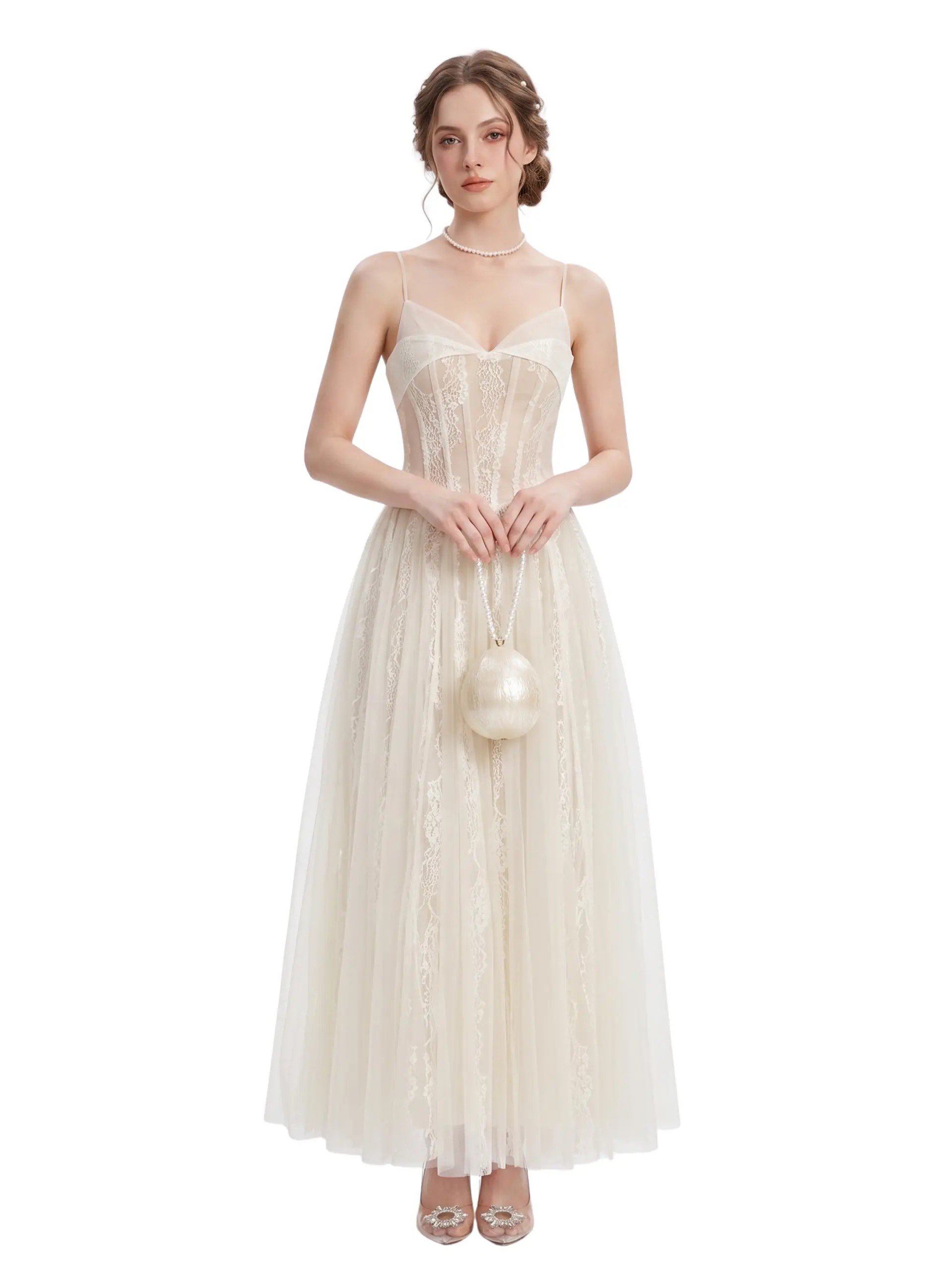 Full-length front view of a model wearing the Hera ivory lace corset maxi dress with a sheer bodice, floral embroidery, and an A-line tulle skirt.