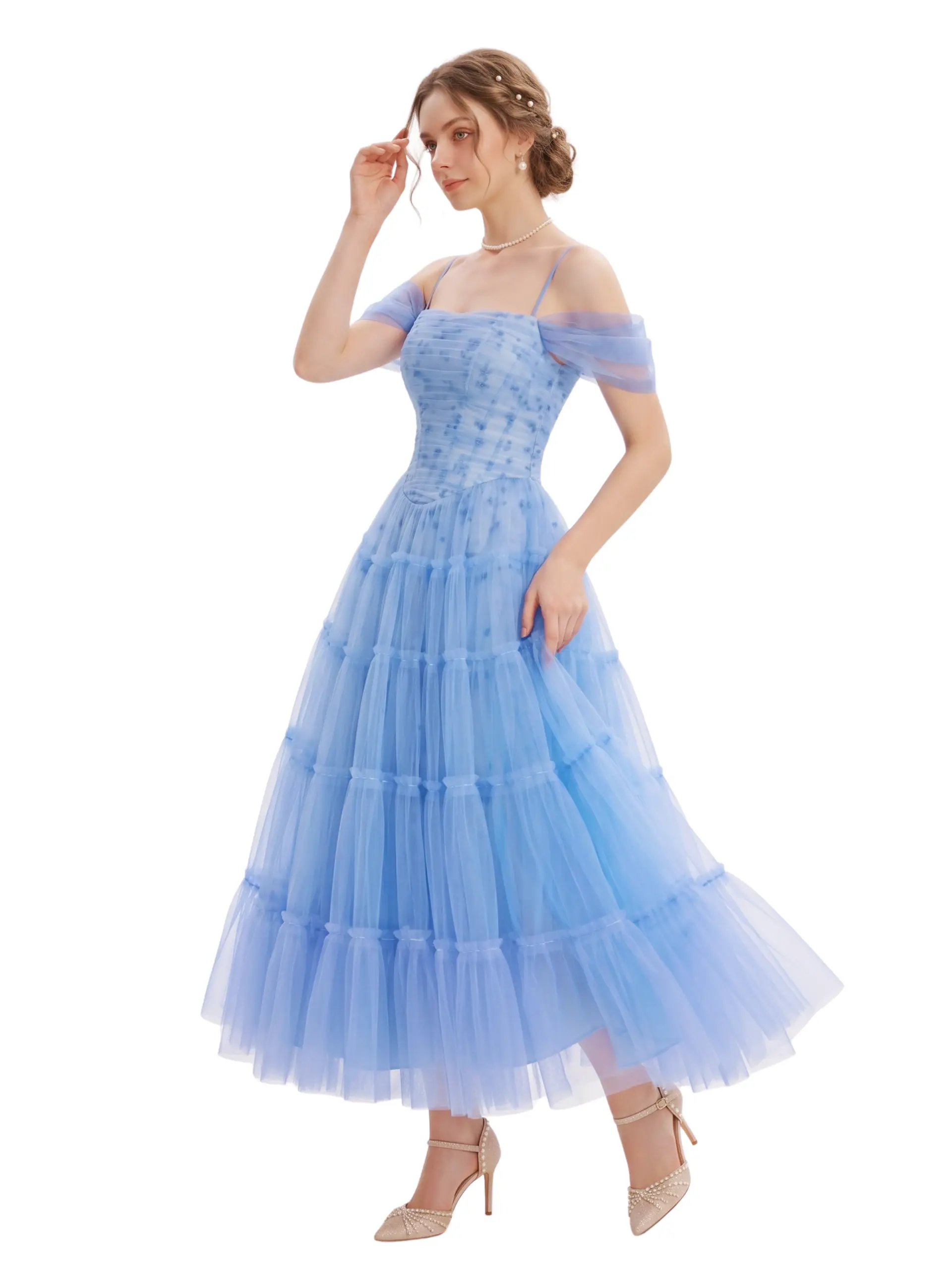 Three-quarter view of the Posy powder blue tulle off-the-shoulder maxi dress with a ruched corset bodice, floral accents, and tiered A-line skirt.