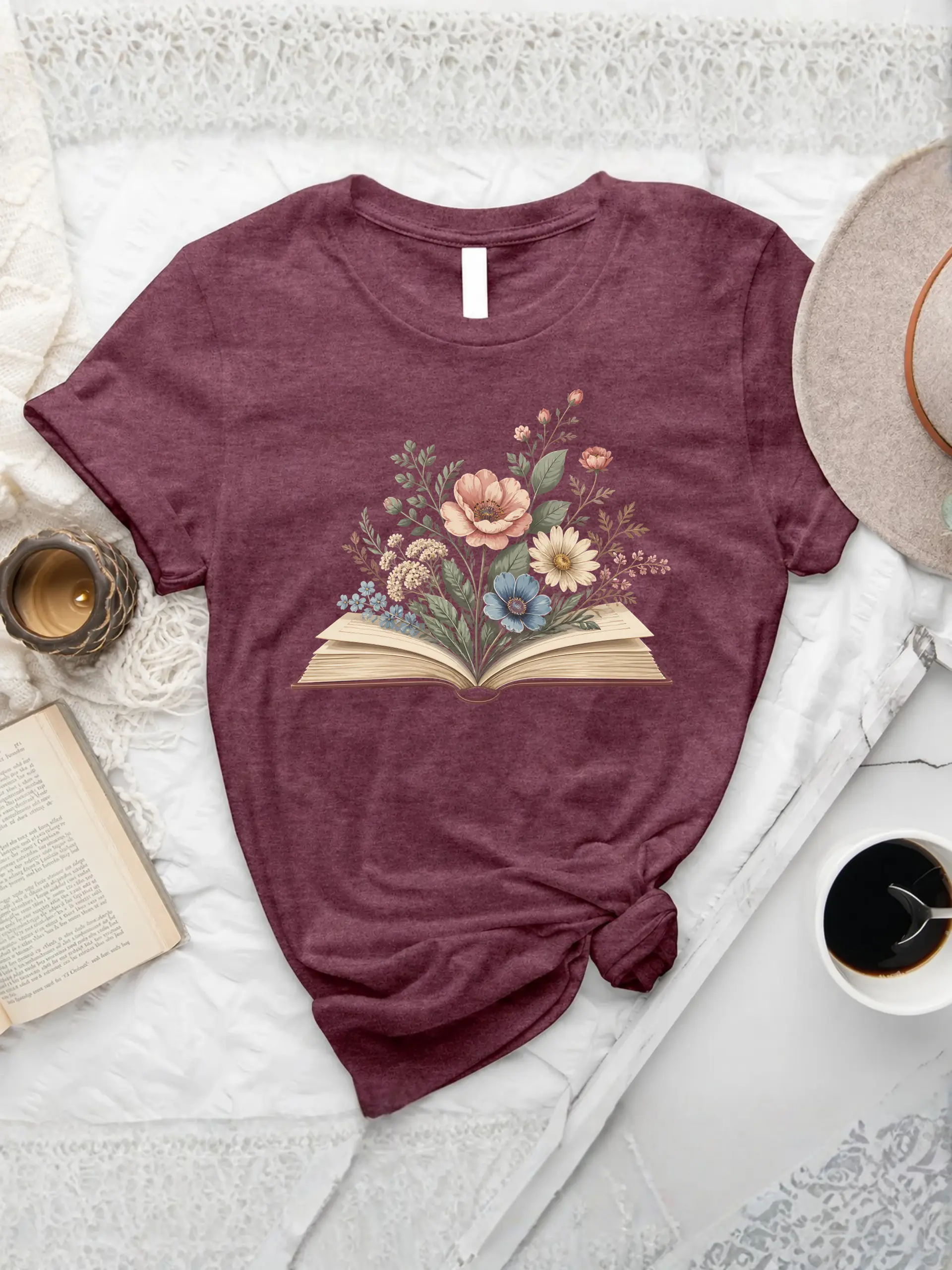 Watercolor Flowers Book T-Shirt in Heather Maroon featuring colorful wildflowers growing from an open book